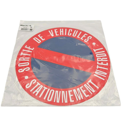 DISQUE PVC "SORTIE DE VEHICULES STATIONNEMENT INTERDIT" Ø280MM
