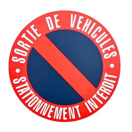 DISQUE PVC "SORTIE DE VEHICULES STATIONNEMENT INTERDIT" Ø280MM